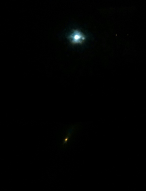 Moon with orange reflection.