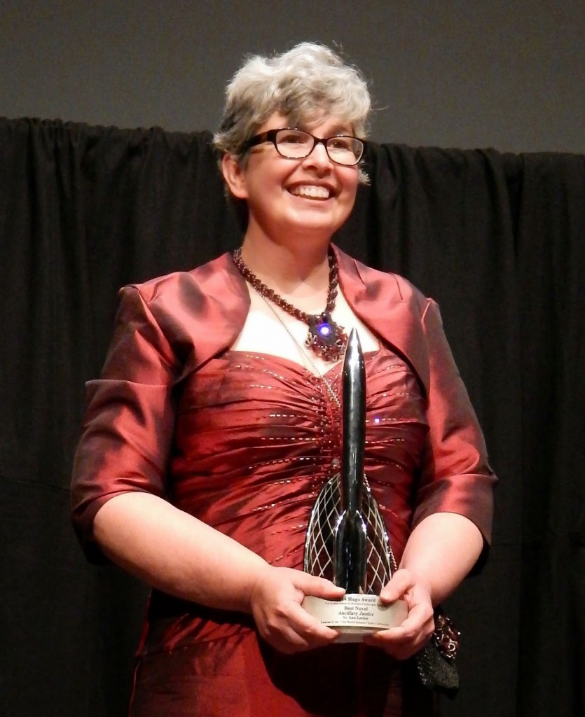 Ann Leckie receiving her Hugo at the LonCon 3 award ceremony in 2014.